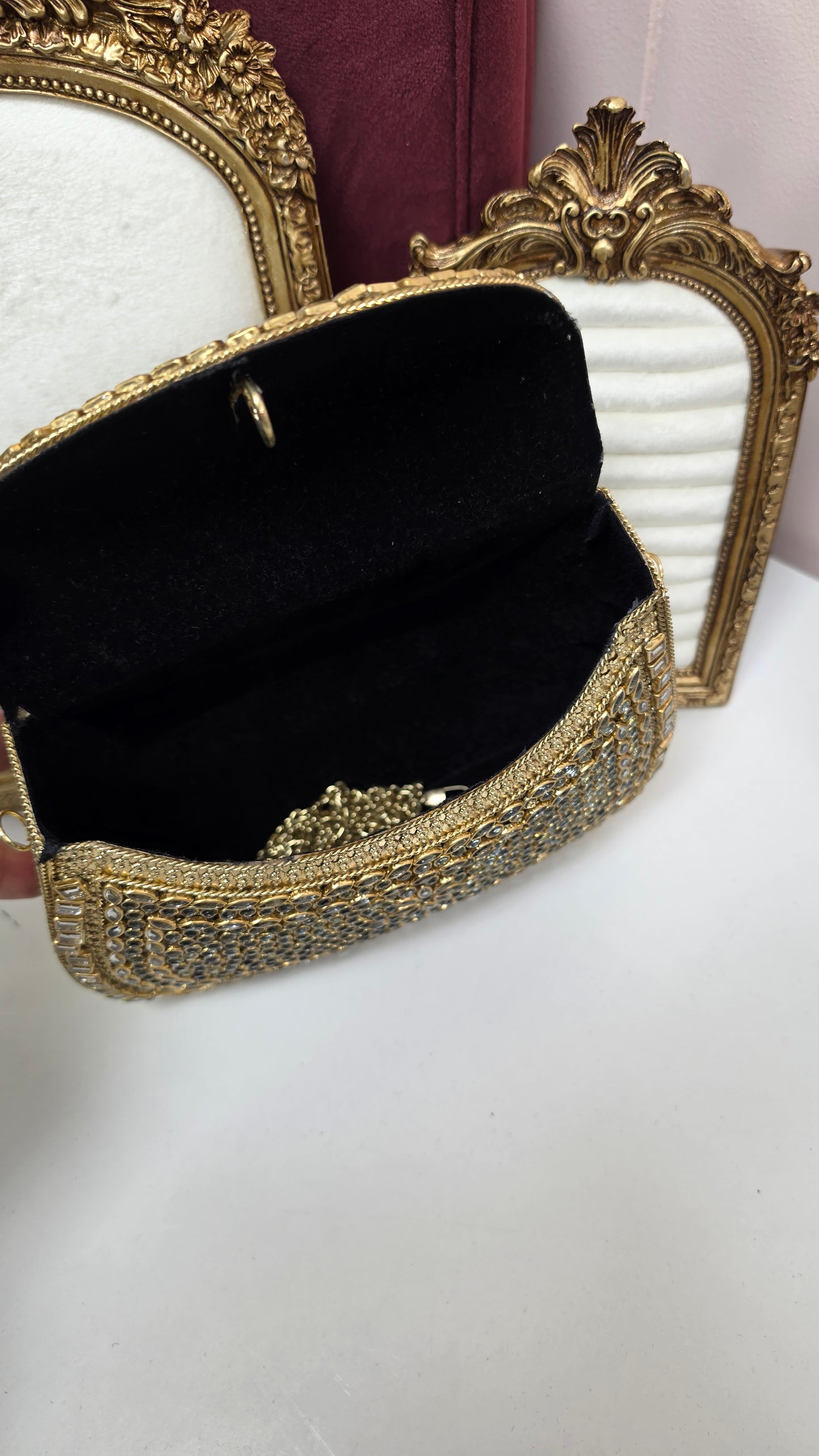 Monika kundan brass clutch
