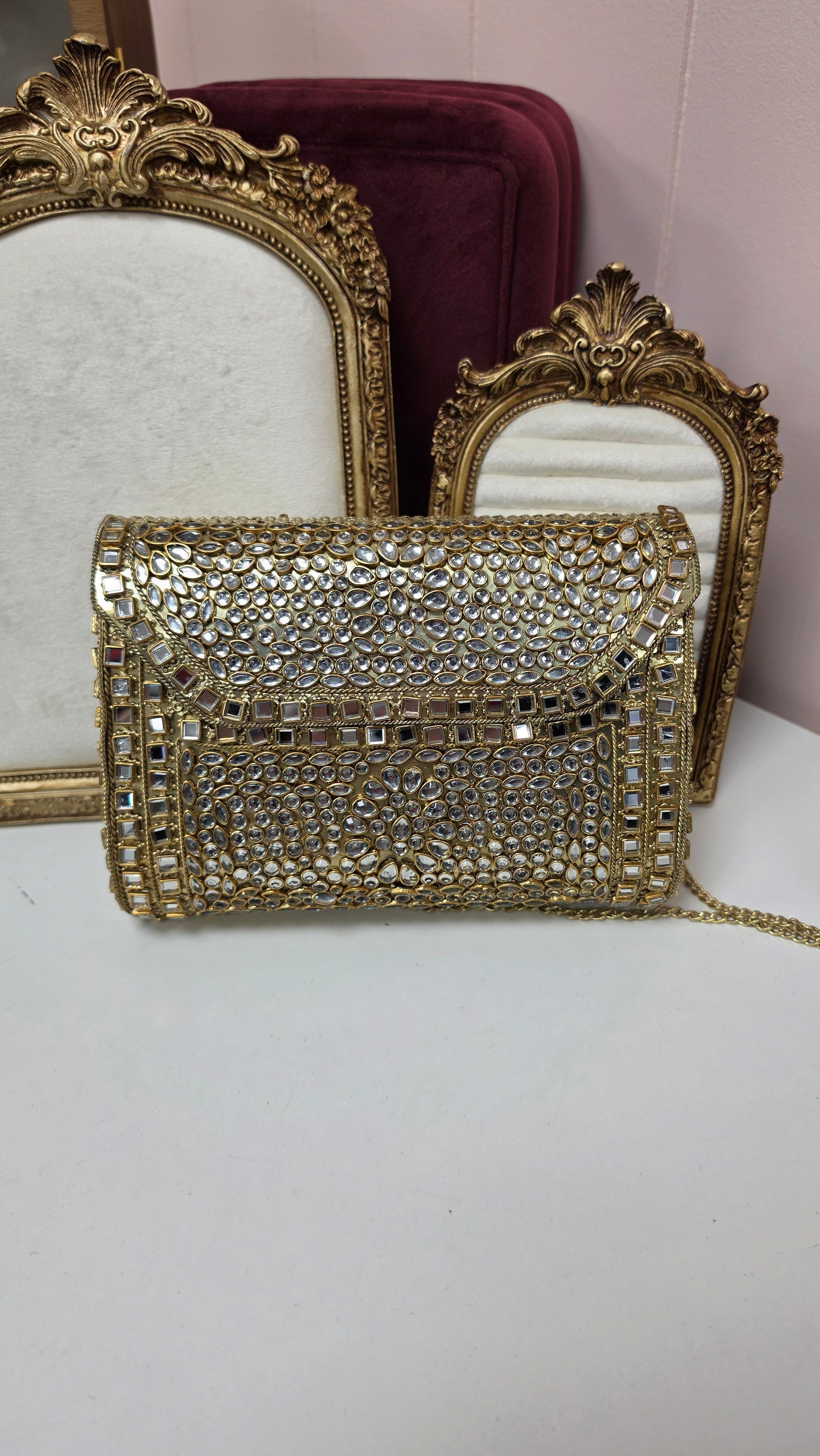 Dua kundan brass clutch