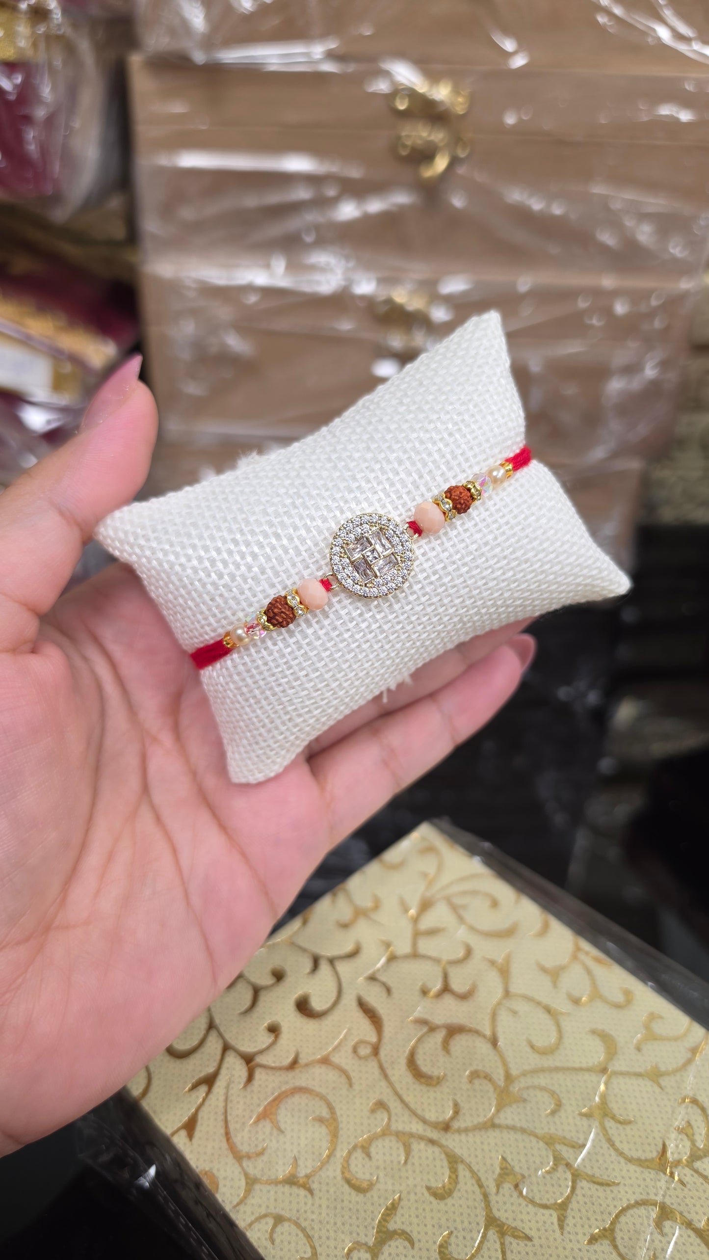 Ad crystal rakhi