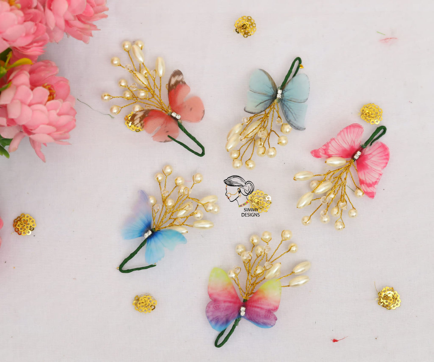 Set of 5 butterfly pins.