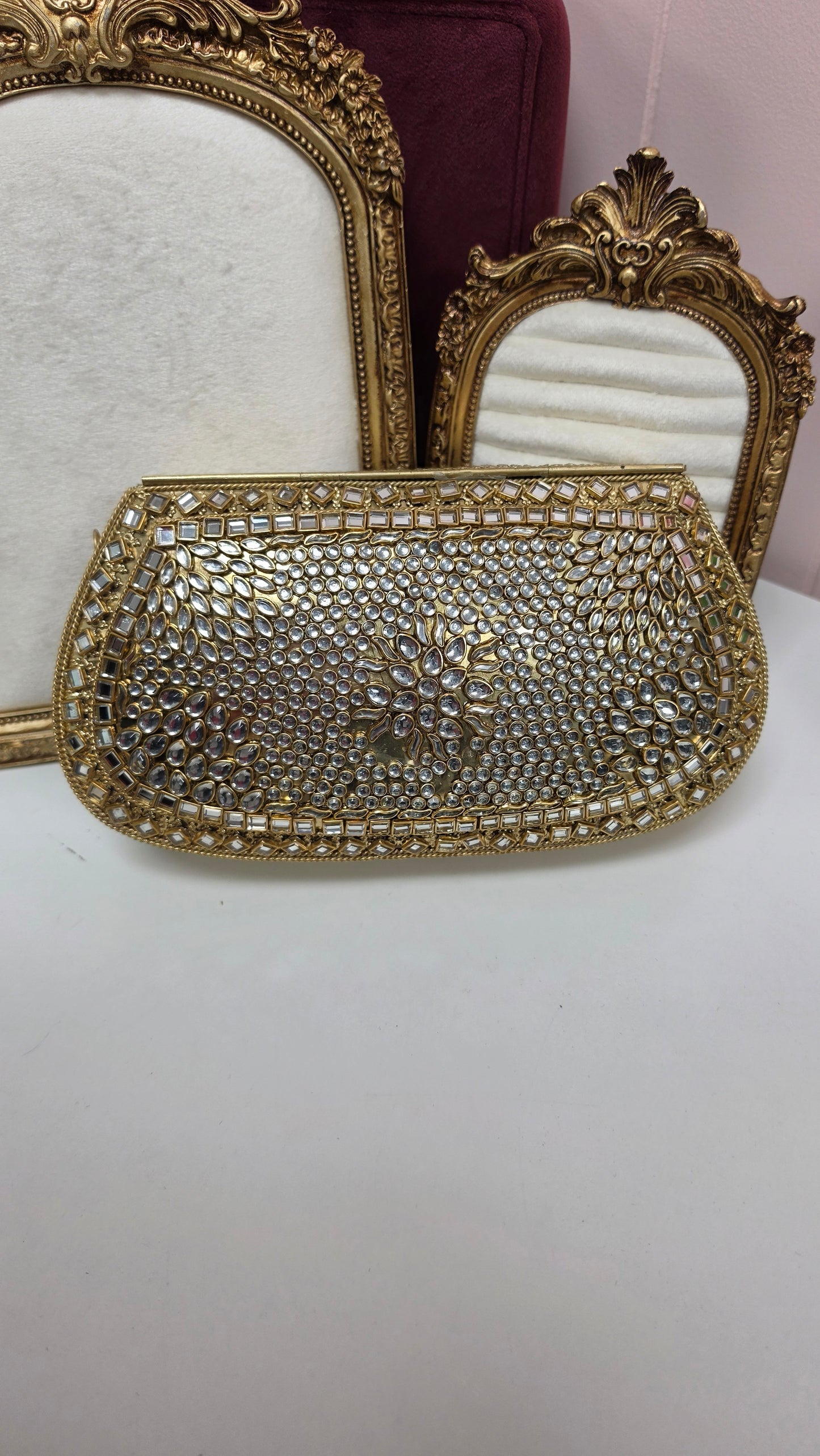 Chavi kundan brass clutch