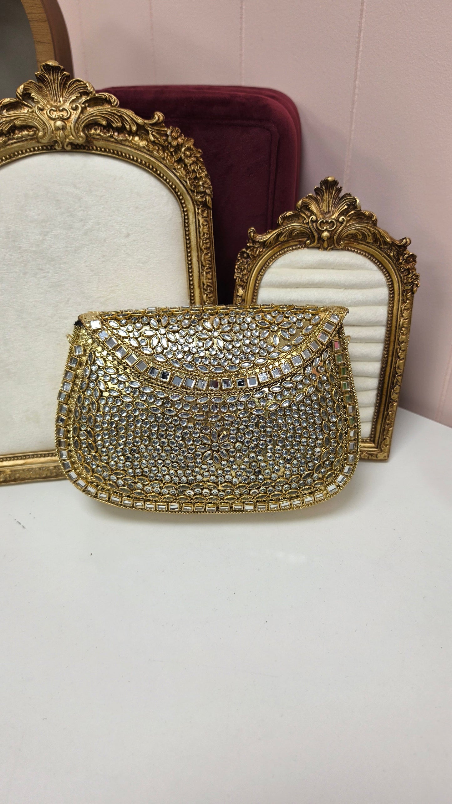 Monika kundan brass clutch