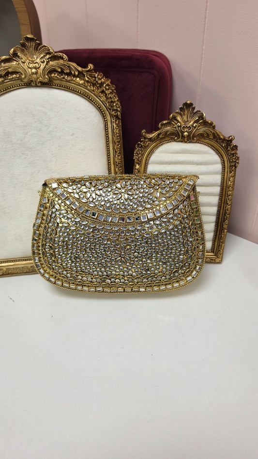 Monika kundan brass clutch