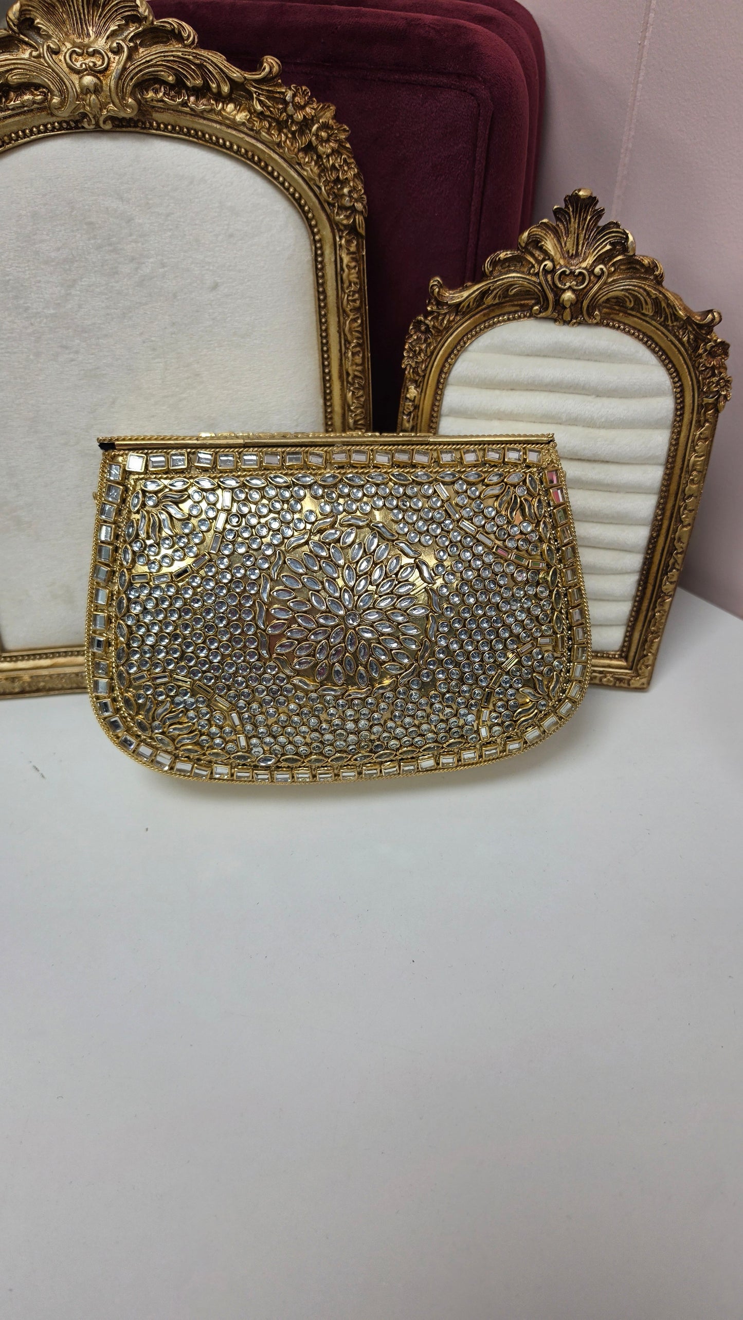 Monika kundan brass clutch
