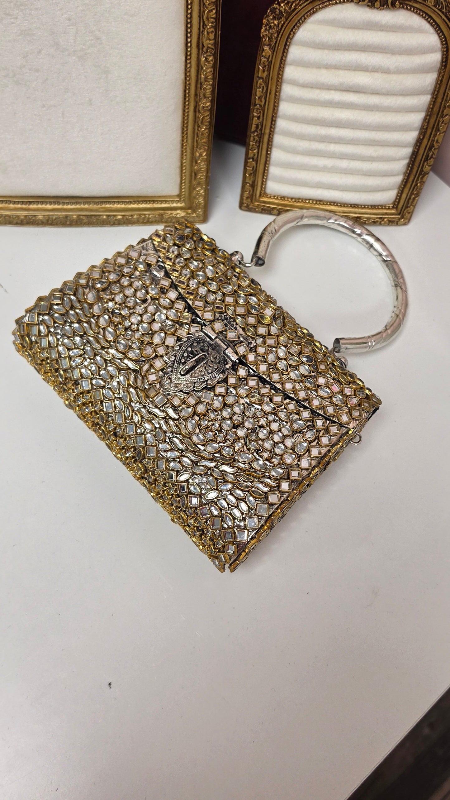 Urmi kundan brass clutch